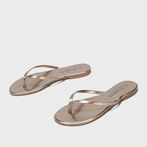 Zu Zhi Ye Metallic Flip Flops
